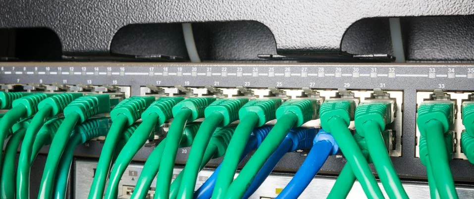 Server rack with green cables Stock Photos
