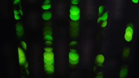 Server rack indicators with green bokeh effect. Blurred light from computer Stock Footage 344905824