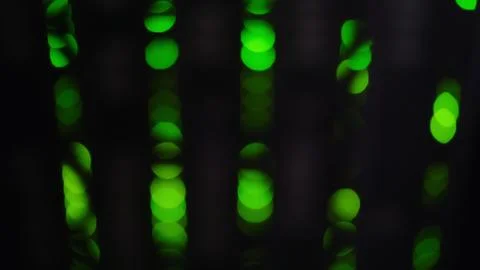 Server rack indicators with green bokeh effect. Blurred light from computer n Stock Photos