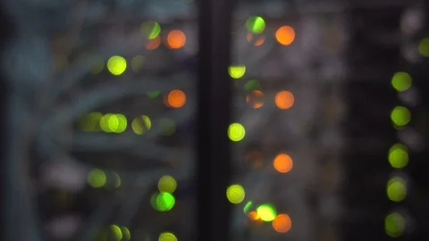 Server rack with lots of flashing green and orange lights. Motion shot. Stock Footage 123605708
