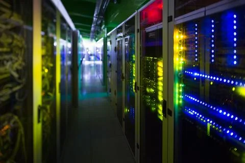 Server rack on right side is showing blinking LED panels in flat design corridor Illustrazione stock