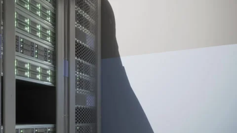 Server rack with visible components in a data center during the day Stock Footage 345043463