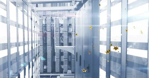 Server racks lining data center aisle under LEDs, with cables, cable-trays and Stock Photos