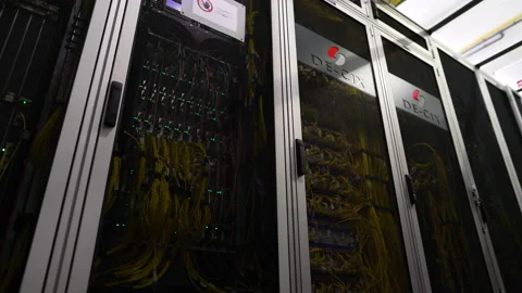 Server Racks in Modern Data Center - Cloud Computing - Internet Traffic Stock Footage 169961647