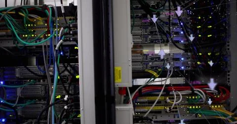Server racks with various cables and blinking lights represent cloud computing 写真素材