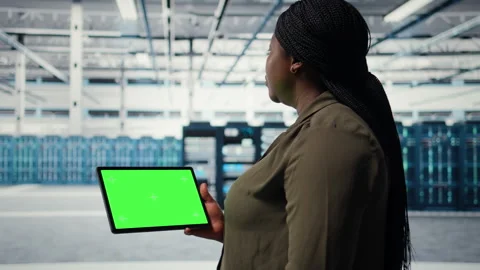 Server room admin uses isolated screen tablet to increase workload capacity Stock Footage 317123211