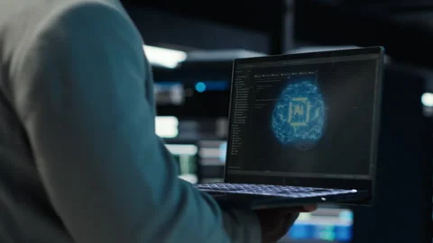 Server room admin using laptop to do infrastructure AI automatization Video stock 311898802