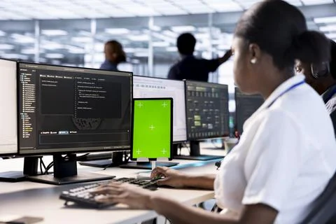 Server room computer scientist using green screen tablet Stock Photos