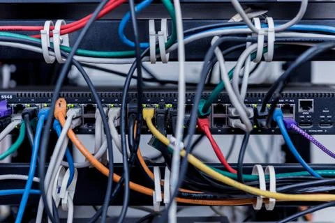 Server room with computers for internet. Network cables connected to switches. 스톡 사진