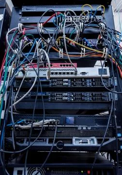 Server room with computers for internet. Network cables connected to switches. 스톡 사진
