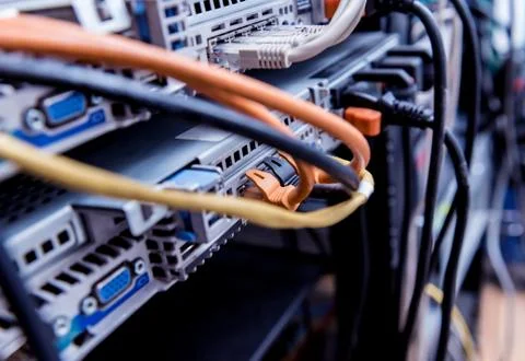 Server room with computers for internet. Network cables connected to switches. 스톡 사진