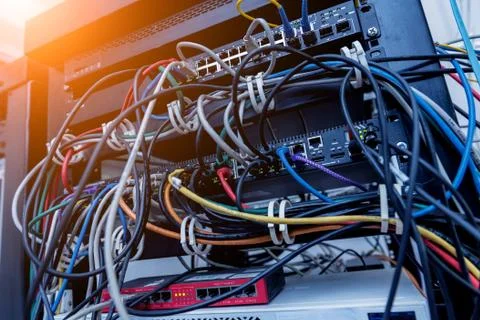 Server room with computers for internet. Network cables connected to switches. 스톡 사진