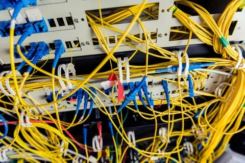 Server room with computers for internet. Network cables connected to switches. 스톡 사진