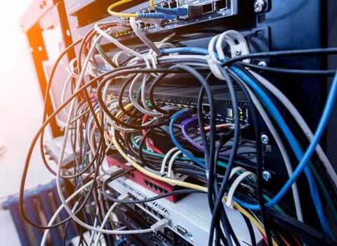Server room with computers for internet. Network cables connected to switches. 스톡 사진