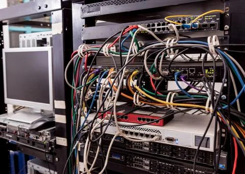 Server room with computers for internet. Network cables connected to switches. 스톡 사진