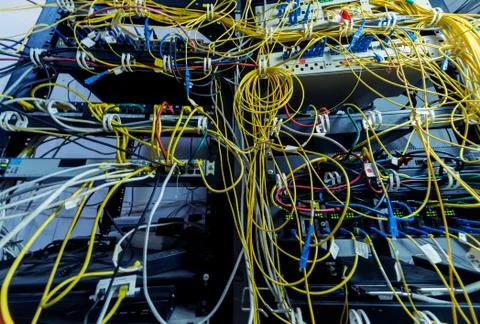 Server room with computers for internet. Network cables connected to switches. 스톡 사진