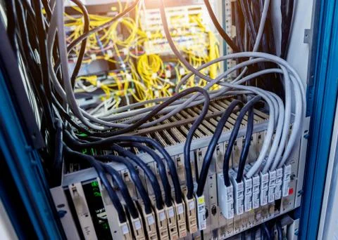 Server room with computers for internet. Network cables connected to switches. 스톡 사진