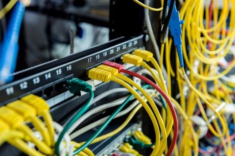 Server room with computers for internet. Network cables connected to switches. 스톡 사진