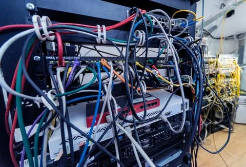 Server room with computers for internet. Network cables connected to switches. 스톡 사진