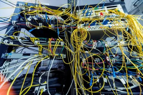 Server room with computers for internet. Network cables connected to switches. 스톡 사진