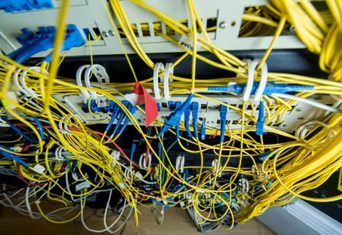 Server room with computers for internet. Network cables connected to switches. 스톡 사진