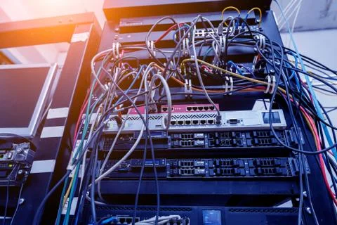 Server room with computers for internet. Network cables connected to switches. 스톡 사진