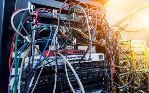 Server room with computers for internet. Network cables connected to switches. 스톡 사진