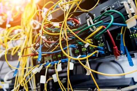 Server room with computers for internet. Network cables connected to switches. 스톡 사진