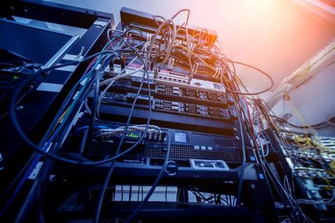 Server room with computers for internet. Network cables connected to switches. 스톡 사진
