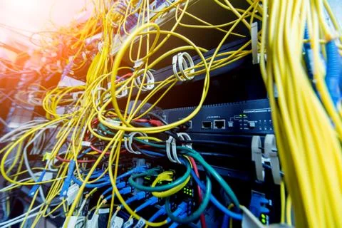 Server room with computers for internet. Network cables connected to switches. 스톡 사진