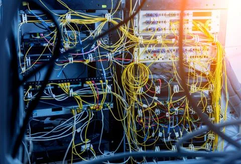Server room with computers for internet. Network cables connected to switches. 스톡 사진