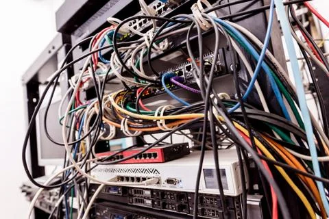 Server room with computers for internet. Network cables connected to switches. 스톡 사진