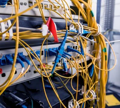 Server room with computers for internet. Network cables connected to switches. 스톡 사진
