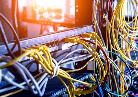 Server room with computers for internet. Network cables connected to switches. 스톡 사진