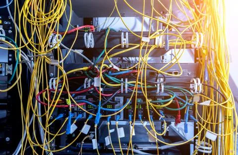 Server room with computers for internet. Network cables connected to switches. 스톡 사진