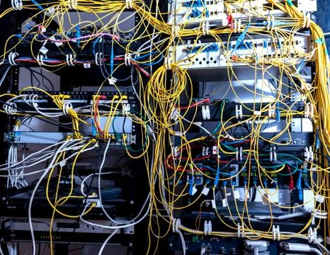 Server room with computers for internet. Network cables connected to switches. 스톡 사진