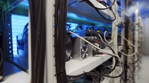 Server room for crypto currency mining farms with coolers set up on shelves. Stock Footage 106220122