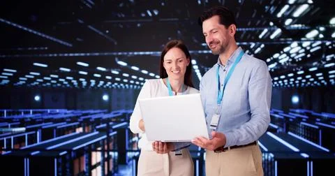 Server Room In Data Center. Cloud Computer Engineers Configuring AI Technolog Stock Photos