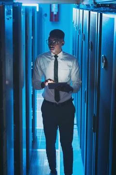 Server room, engineer and black man on tablet for cybersecurity, diagnostic.. Stock Photos