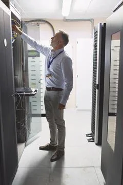 Server room, engineer and inspection with cybersecurity for hardware 写真素材