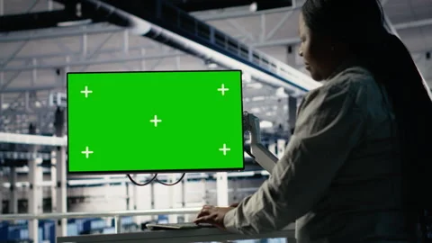 Server room female programmer using green screen computer Stock Footage 314686027