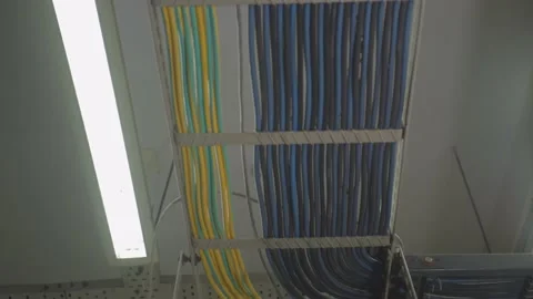 Server room has a lot of wires. Many rows of wires on the ceiling Stock Footage 220179446