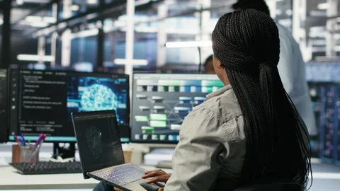 Server room IT expert using laptop to apply artificial intelligence technology Stock Footage 308044917