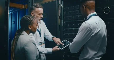 Server room, network and manager with people on tablet for cybersecurity Stock Photos