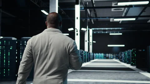 Server room software developer troubleshooting errors using software Stock Footage 311833449