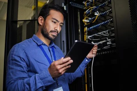 Server room, tablet and engineer with connection cable for maintenance or Stock Photos
