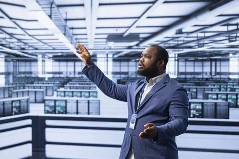 Server room worker resolving technical issues using augmented reality Stock Photos