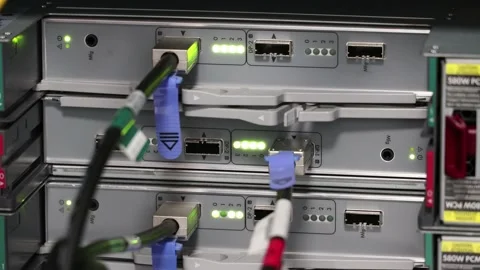 The server is running a computer station rear view LEDs are blinking Stock Footage 157828780