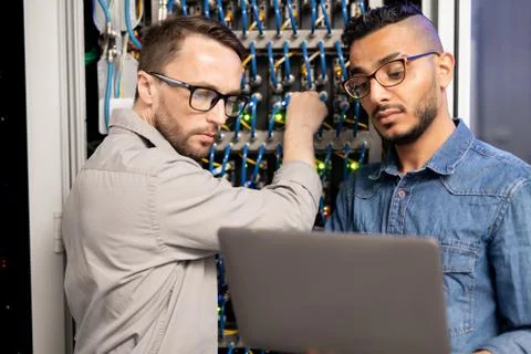 Server specialists testing network system Stock Photos