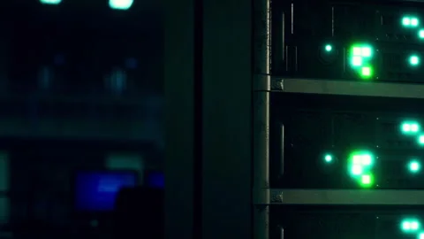 Servers with green lights in a data center during night hours Stock Footage 345007469